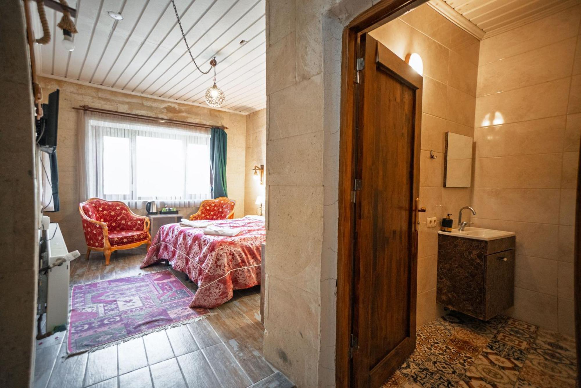 Adelya Cave Hotel Гьореме Номер фото