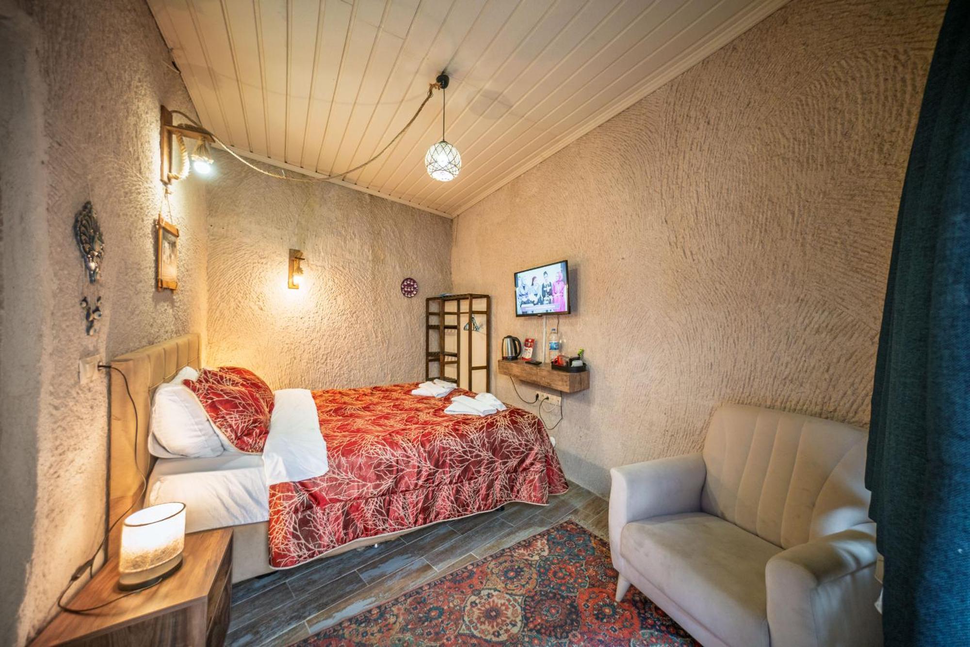 Adelya Cave Hotel Гьореме Номер фото