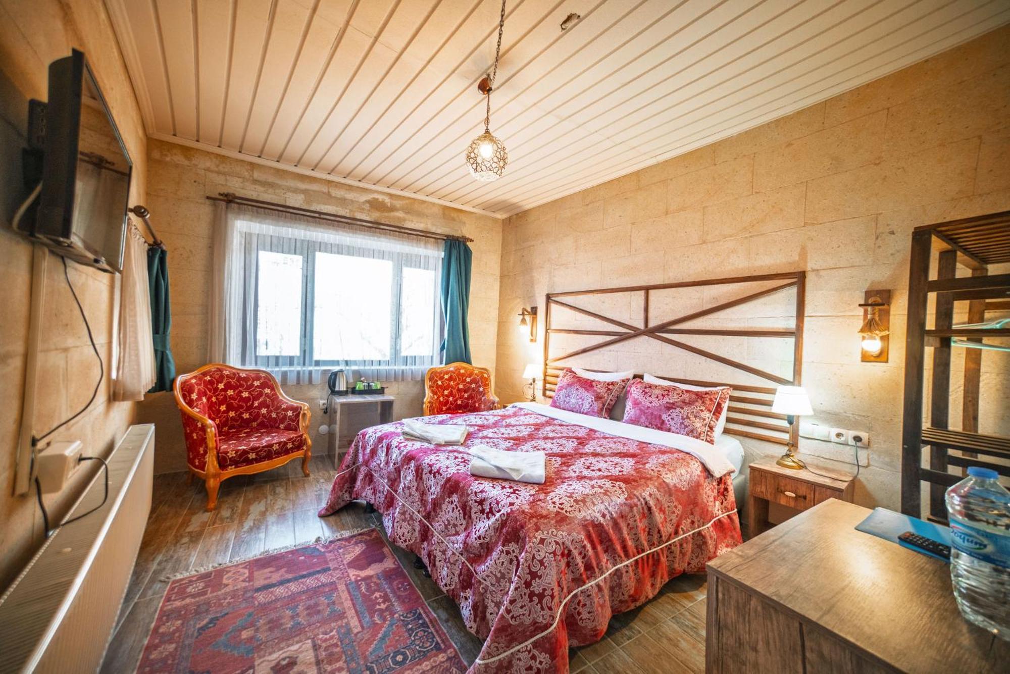 Adelya Cave Hotel Гьореме Номер фото