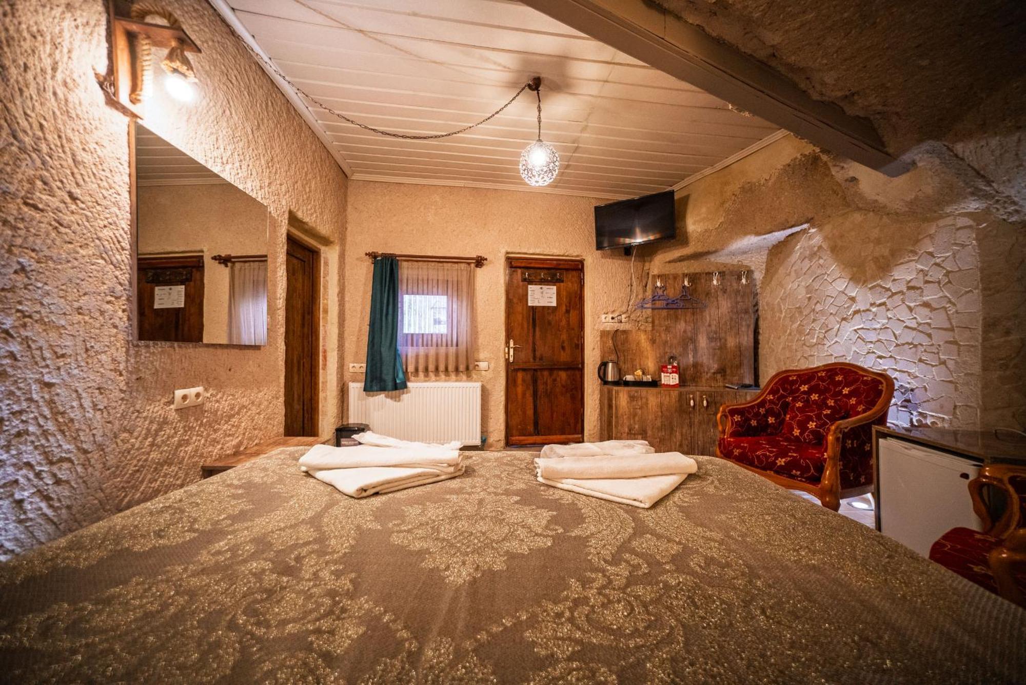 Adelya Cave Hotel Гьореме Номер фото